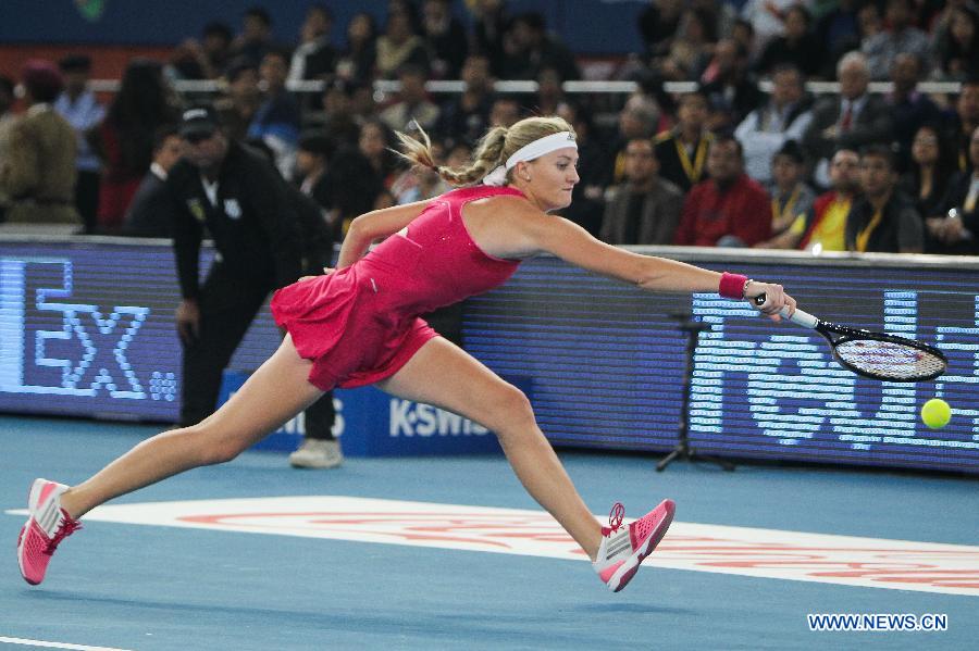 Kristina Mladenovic of UAE Royals returns a ball during the match against Ana Ivanovic of Indian Aces at the Indian Leg of the International Premier Tennis League in New Delhi, India, Dec. 8, 2014. UAE Royals won 29-22. (Xinhua/Zheng Huansong) 