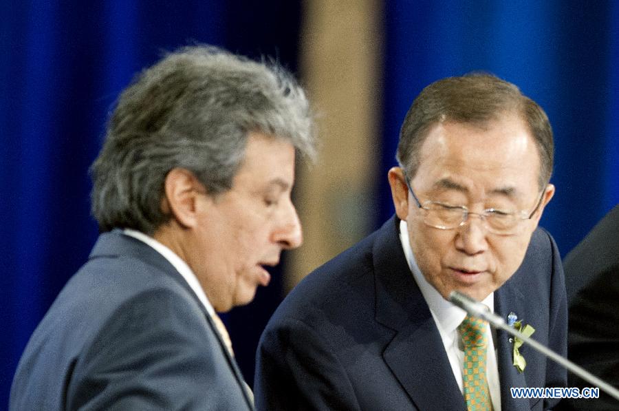 United Nations Secretary-General Ban Ki-moon (R) talks with COP 20/CMP 10 President Manuel Pulgar-Vidal, at the high-level segment of the United Nations Conference on Climate Change in Lima, capital of Peru, Dec. 9, 2014. 