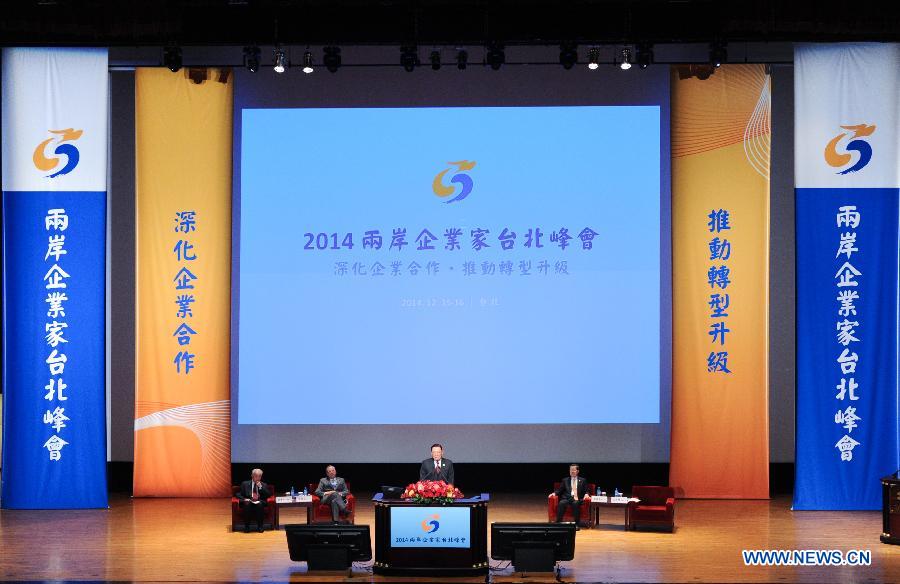 Chiang Pin-kung, vice president of the Taiwan-based council of the Cross-Strait Entrepreneurs Summit, presides over the opening ceremony of the Cross-Strait Entrepreneurs Summit in Taipei, southeast China's Taiwan, Dec. 15, 2014. (Xinhua/Shen Hong)