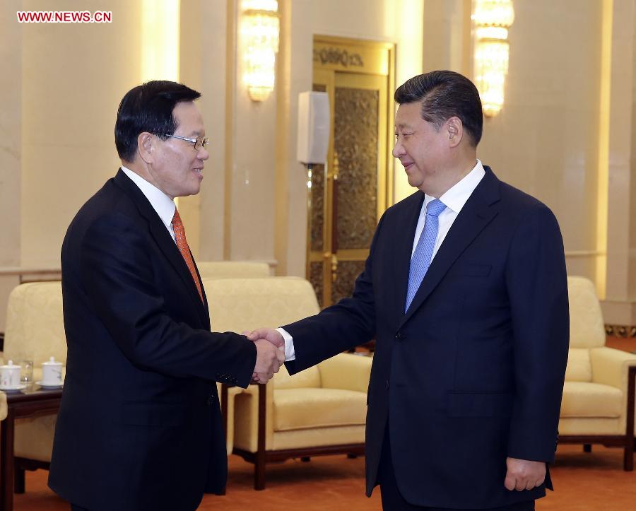 Chinese President Xi Jinping (R) meets with Chung Ui-hwa, speaker of the National Assembly for the Republic of Korea(ROK), in Beijing, China, Dec. 18, 2014. (Xinhua/Ding Lin)