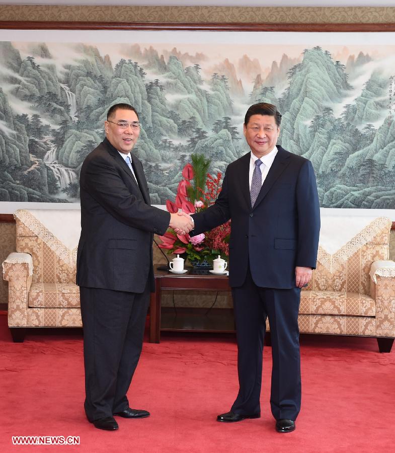 Chinese President Xi Jinping (R) meets with Chui Sai On, Chief Executive of the Macao Special Administrative Region, in south China's Macao, Dec. 19, 2014. (Xinhua/Liu Jiansheng) 