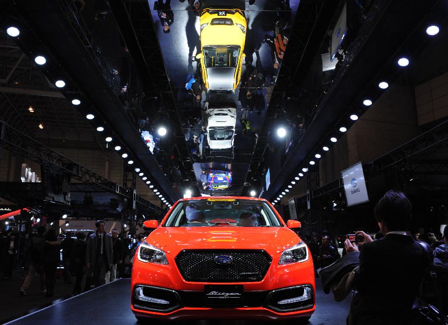 Cars are displayed during the Tokyo Auto Salon at Makuhari Messe in Chiba, Japan, Jan. 9, 2015.