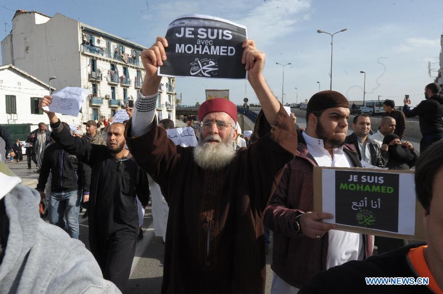 Algerian people protest against sarcastic cartoons on the Prophet of Islam Muhammad, which have been published in the latest edition of French weekly Charlie Hebdo, in the capital city of Algiers, Algeria, Jan. 16, 2015.