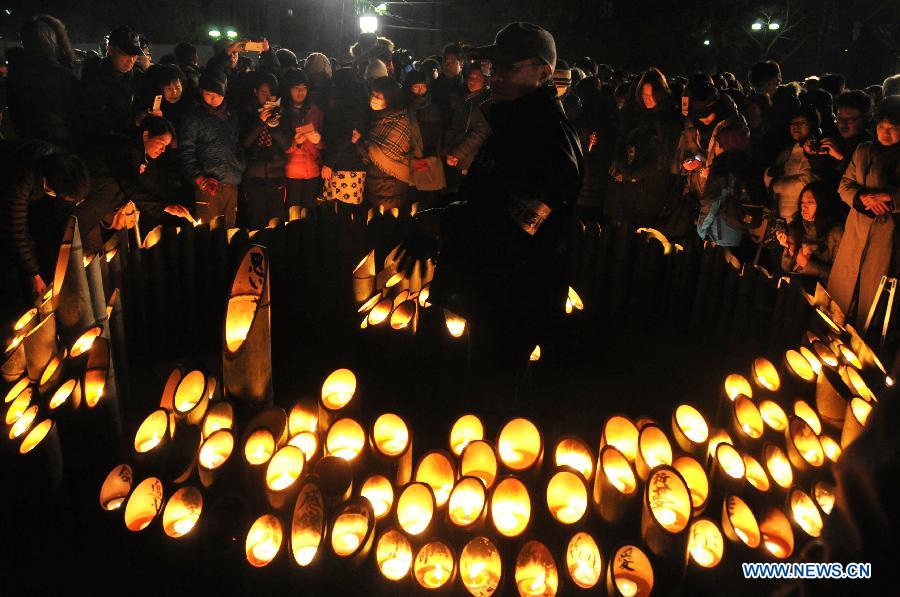 More than 14,000 people gathered in Japan's Kobe on Friday morning to pray for the souls of the 6,434 victims of the 1995 Great Hanshin Earthquake.