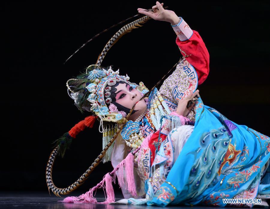 Peking Opera actress Zhou Meihui performs 'The Princess and The Consort Prince' during the 'Cultures of China, Festival of Spring' performance in Atlanta, Georgia, the United States, Feb. 26, 2015.