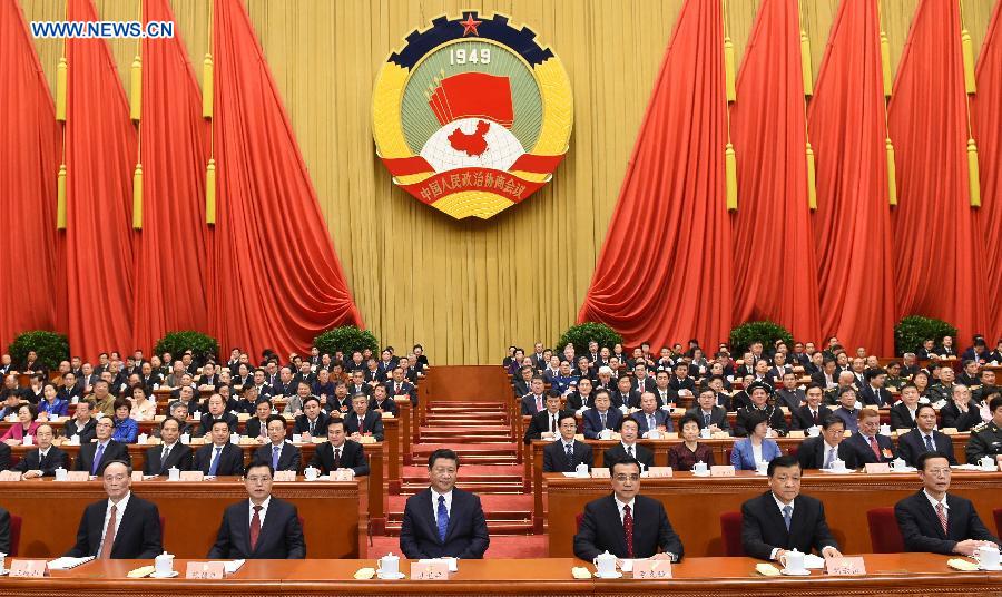 Xi Jinping (3rd L, front), Li Keqiang (3rd R, front), Zhang Dejiang (2nd L, front), Liu Yunshan (2nd R, front), Wang Qishan (1st L,front) and Zhang Gaoli (1st R, front) attend the opening meeting of the third session of the 12th National Committee of the Chinese People's Political Consultative Conference (CPPCC) at the Great Hall of the People in Beijing, capital of China, March 3, 2015.  