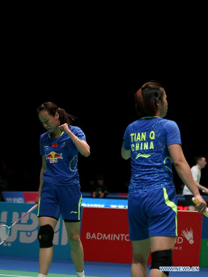 Tian Qing and Zhao Yunlei (L) of China react during the women's doubles first round match between Tian Qing/Zhao Yunlei of China and Lee So Hee/Shin Seung Chan of Korea at the All England Open Badminton Championships at Barclaycard Arena in Birmingham, Britain on March 4, 2015. 