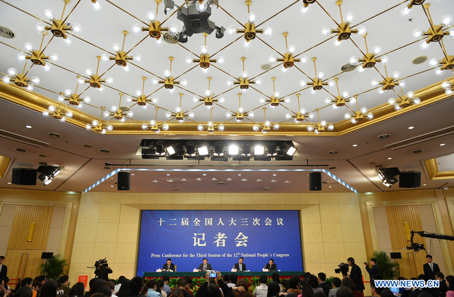 Chinese finance minister Lou Jiwei and vice finance minister Liu Kun give a press conference for the third session of China's 12th National People's Congress (NPC) on fiscal and tax reform, in Beijing, capital of China, March 6, 2015.