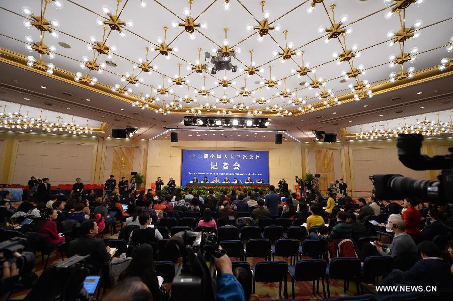 Kan Ke, Zheng Shuna, Yuan Jie, Wang Aili, Wu Zeng, officials of the Commission for Legislative Affairs of the National People's Congress (NPC) Standing Committee, give a press conference about the draft revision to the Legislation Law in Beijing, capital of China, March 9, 2015. 