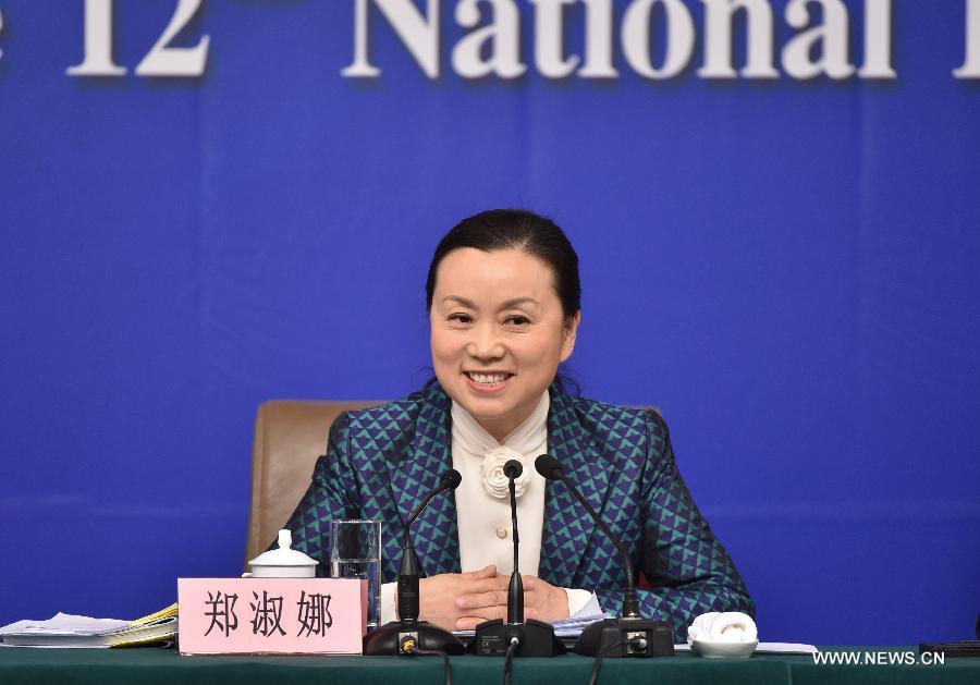 Zheng Shuna, deputy director of the Commission for Legislative Affairs of the National People's Congress (NPC) Standing Committee, speaks at a press conference about the draft revision to the Legislation Law in Beijing, capital of China, March 9, 2015. 