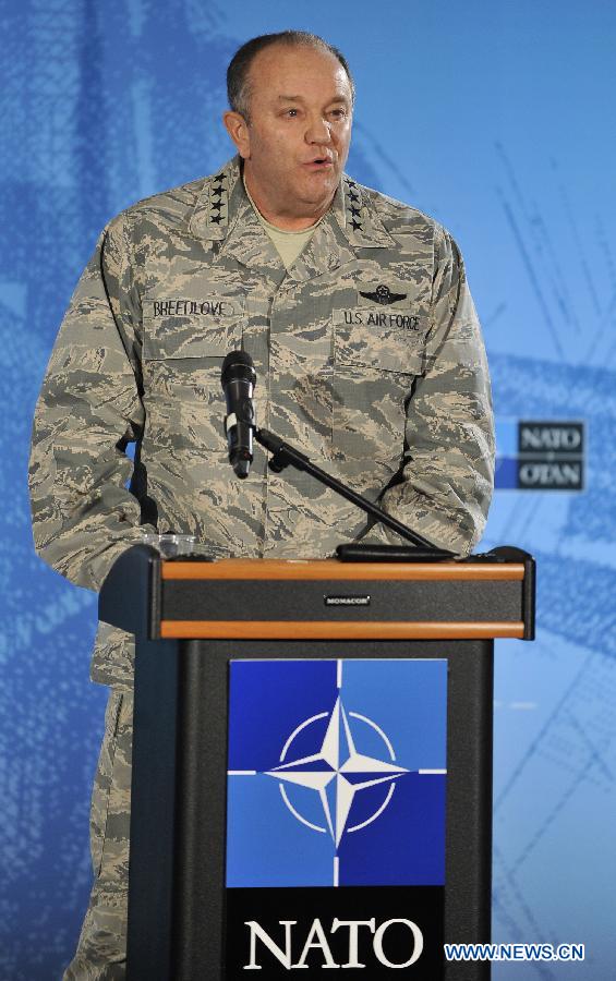 NATO's Supreme Allied Commander Europe (SACEUR) General Philip Breedlove attends a press conference with NATO Secretary General Jens Stoltenberg (not seen) at NATO's Supreme Headquarters Allied Powers Europe (SHAPE) near Mons of Belgium on March 11, 2015.