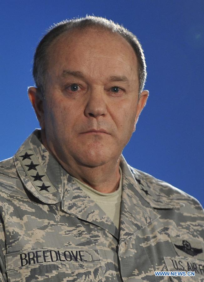 NATO's Supreme Allied Commander Europe (SACEUR) General Philip Breedlove attends a press conference with NATO Secretary General Jens Stoltenberg (not seen) at NATO's Supreme Headquarters Allied Powers Europe (SHAPE) near Mons of Belgium on March 11, 2015.