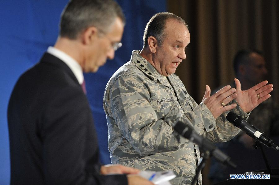 NATO Secretary General Jens Stoltenberg (L) and the Supreme Allied Commander Europe (SACEUR) General Philip Breedlove attend a press conference at NATO's Supreme Headquarters Allied Powers Europe (SHAPE) near Mons of Belgium, March 11, 2015.