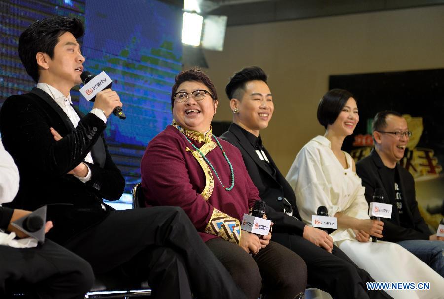 Singer Li Jian (1st L) answers questions at an interview during the TV show 'I Am A Singer' in Changsha, capital of central China's Hunan Province, March 27, 2015.