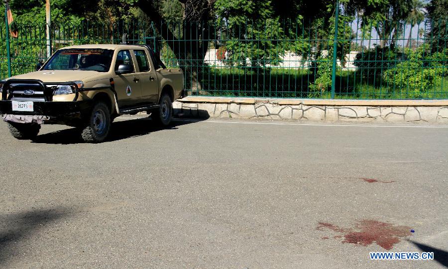 Photo taken on April 8, 2015 shows the site of gunfire in Jalalabad, capital of east Afghanistan's Nangahar Province.