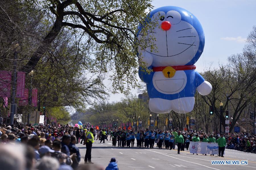 A Doraemon balloon is seen during the annual Cherry Blossom Festival Parade along the Constitution Avenue in Washington D.C., capital of the United States, April 11, 2015.