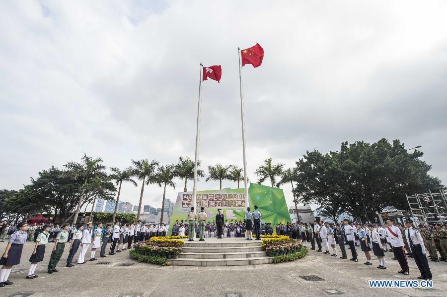 A national flag-raising ceremony is held in Hong Kong, south China, May 4, 2015, to celebrate the Chinese Youth Day marking the May 4th Movement that happened on May 4, 1919, ushering in the new-democratic revolution in China. (Xinhua/Lui Siu Wai)