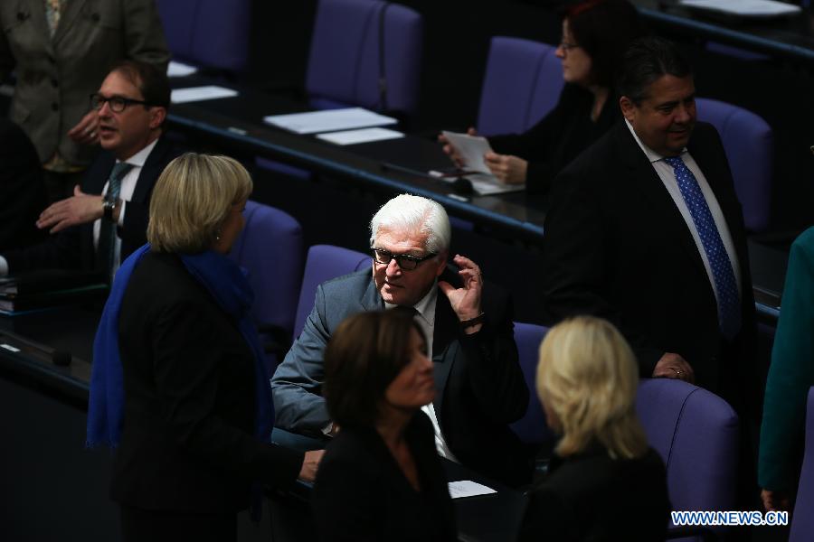 German Foreign Minister Frank-Walter Steinmeier (C) attends a session in memorial of the 70th anniversary of the end of World War II in Berlin, Germany, on May 8, 2015.