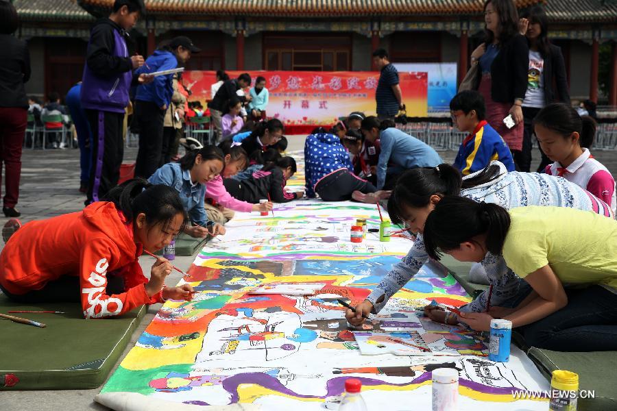 The ten-day painting and calligraphy exhibition, displaying more than 300 works created by primary school students, opened in Beijing Tuesday. 