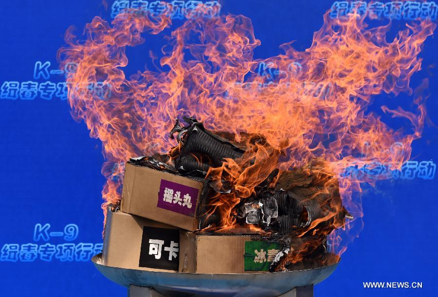 Photo taken on June 15, 2015 shows drugs seized in drug busts being destroyed at a launching ceremony of an anti-drugs campaign in Guangzhou, capital of south China's Guangdong Province. 