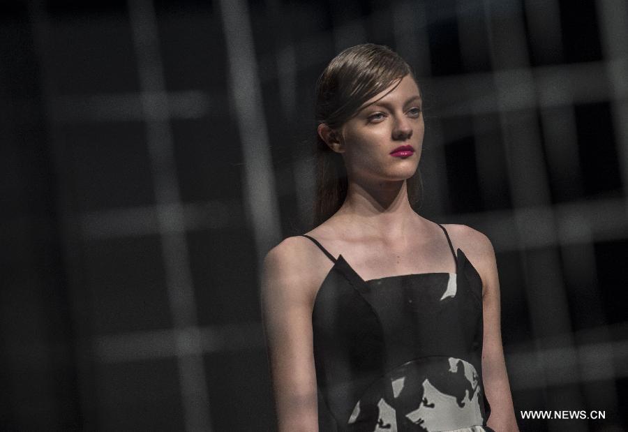 A model displays the creation at the Hong Kong Fashion Week for Spring/Summer in Hong Kong, south China, July 6, 2015. 