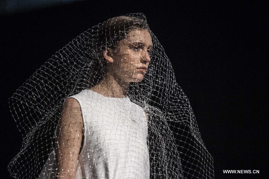 A model displays the creation at the Hong Kong Fashion Week for Spring/Summer in Hong Kong, south China, July 6, 2015. 