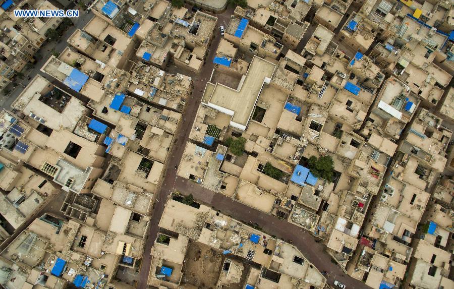 Photo taken on July 6, 2015 shows an aerial view of the old town of Kax, northwest China's Xinjiang Uygur Autonomous Region.