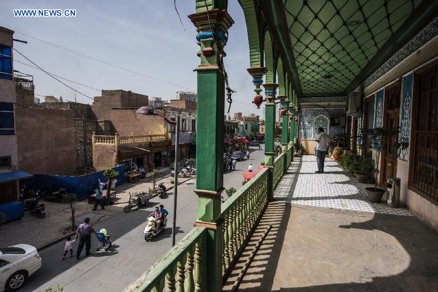 Photo taken on June 4, 2015 shows a street in the old town of the old town of Kax, northwest China's Xinjiang Uygur Autonomous Region.