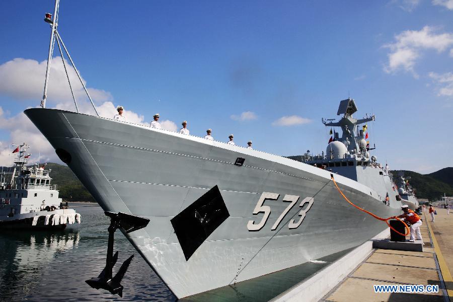 A Chinese navy vessel prepare to sail at a naval port in Sanya, south China's Hainan Province, Agu. 4, 2015. 