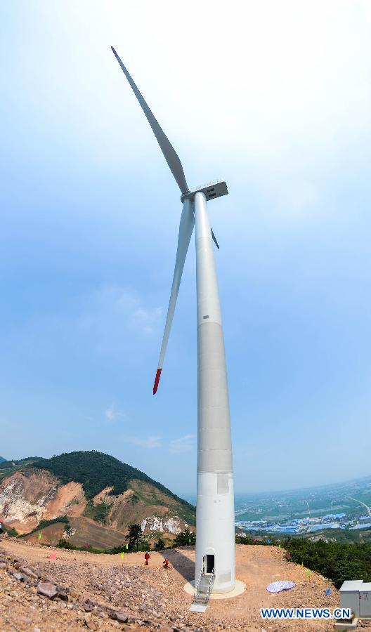 A low wind speed wind farm achieves grid connection and commissions in Changxing County, east China's Zhejiang Province, Aug. 5,2015.