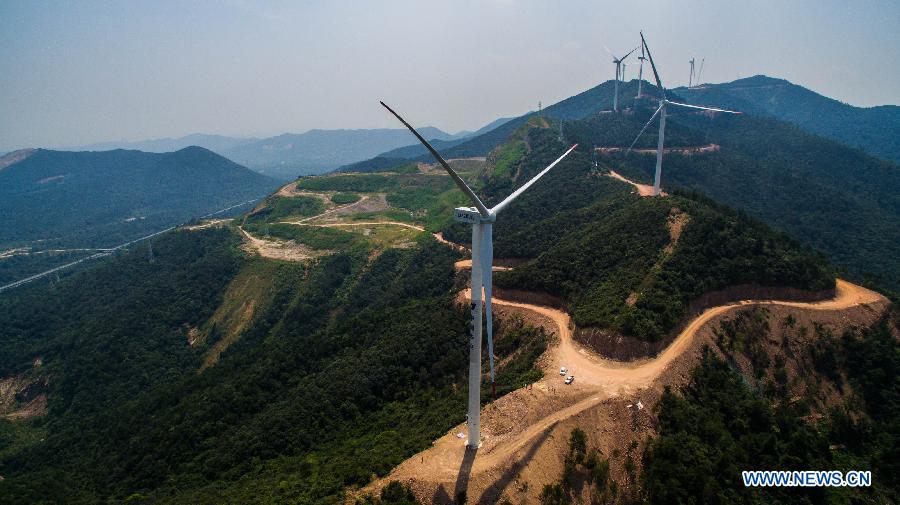 A low wind speed wind farm achieves grid connection and commissions in Changxing County, east China's Zhejiang Province, Aug. 5,2015. 