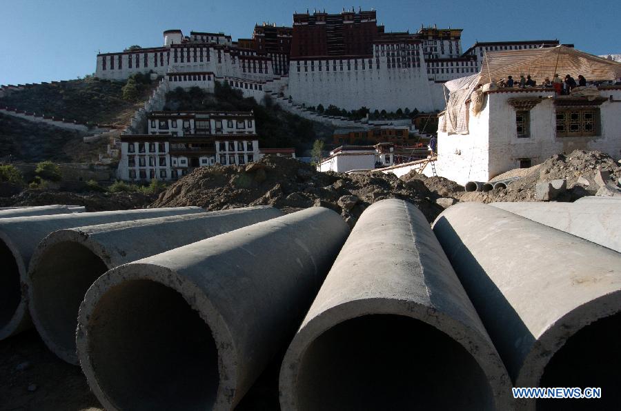 Photo taken on June 26, 2005 shows the Potala Palace square under construction in Lhasa, capital of southwest China's Tibet Autonomous Region. 