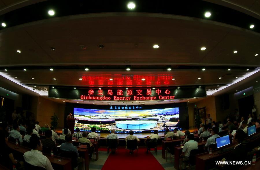 Photo taken on Aug. 11, 2015 shows the opening ceremony of the Qinhuangdao Energy Exchange Center in Qinhuangdao, north China's Hebei Province. The energy exchange center, which was put into use on Tuesday, is the first spot transaction center for refined oil products in north China.