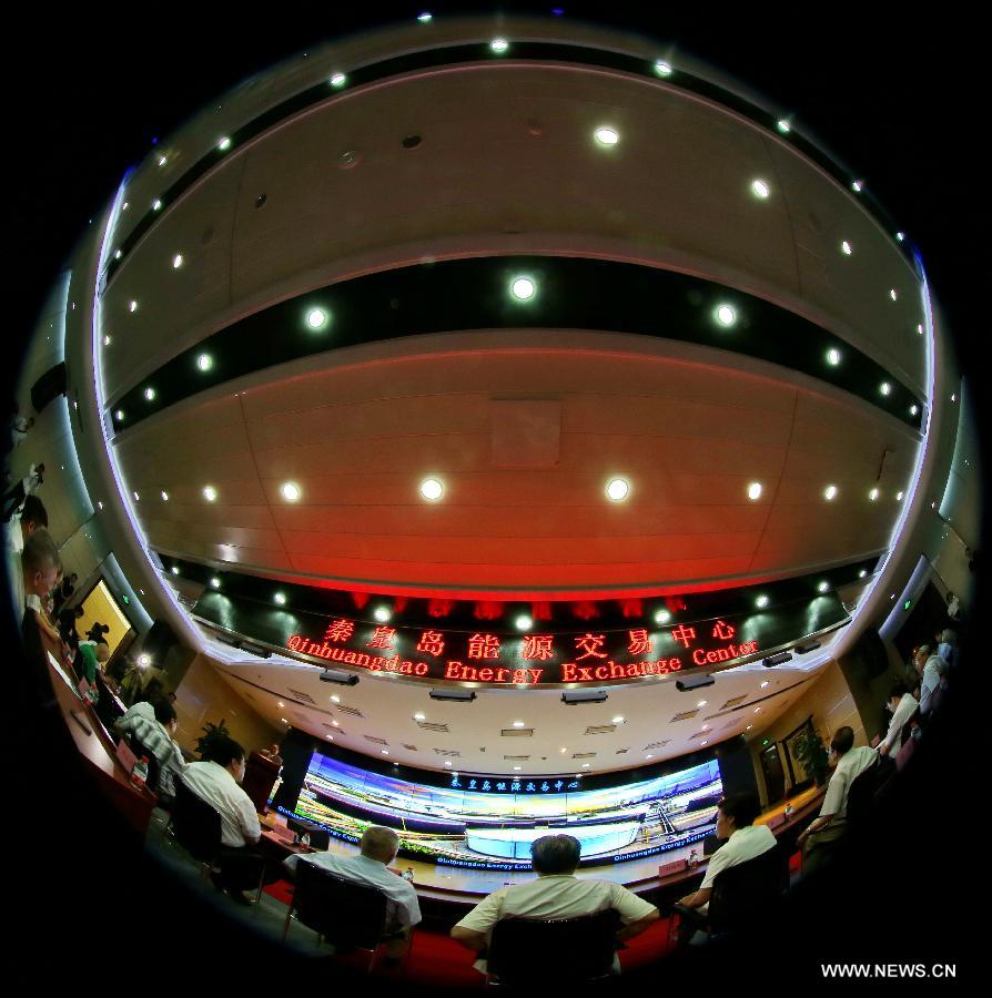 A fish-eye lens picture taken on Aug. 11, 2015 shows the opening ceremony of Qinhuangdao Energy Exchange Center in Qinhuangdao, north China's Hebei Province.The energy exchange center, which was put into use on Tuesday, is the first spot transaction center for refined oil products in north China.