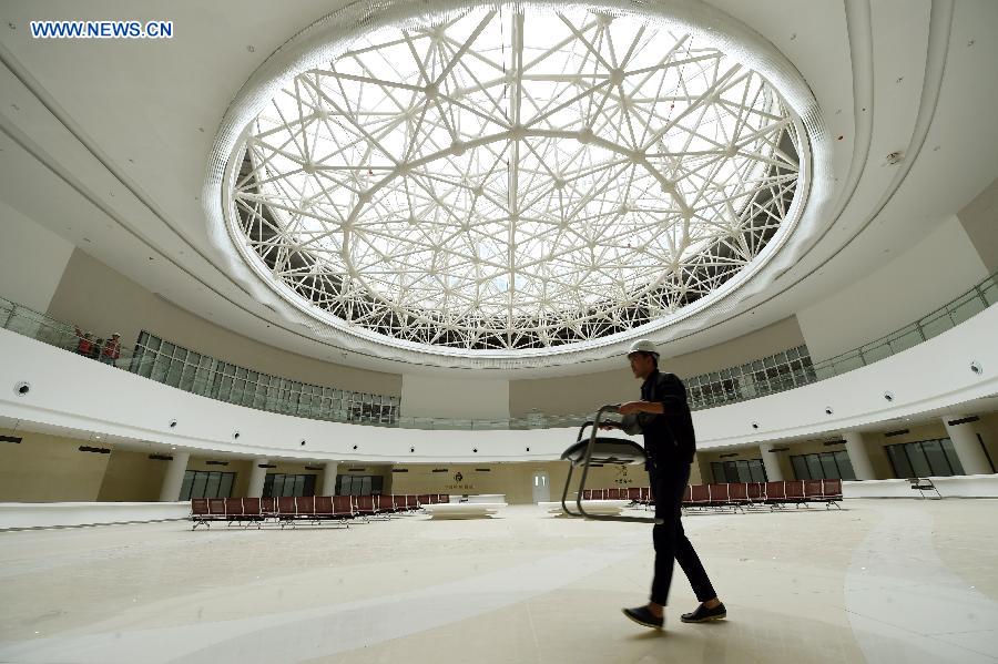 Photo taken on Aug. 18, 2015 shows the service hall of the Lanzhou New Area Free Trade Zone in Lanzhou, capital of northwest China's Gansu Province, Aug. 18, 2015. 