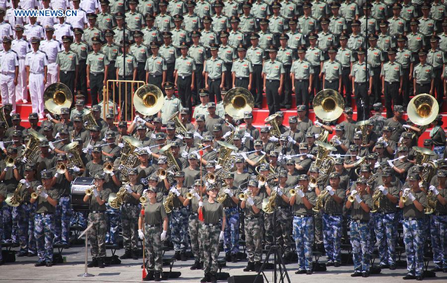 Photo taken on July 26, 2015 shows soldiers of the military band participating in training for the Sept. 3 military parade at the parade training base in Beijing. 