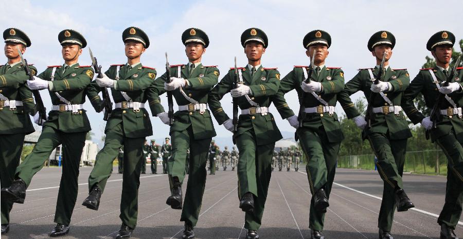 Photo taken on Aug. 14, 2015 shows soldiers participating in training for the Sept. 3 military parade at the parade training base in Beijing. 