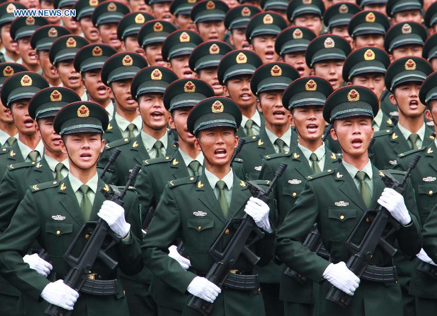 Photo taken on July 22, 2015 shows soldiers participating in training for the Sept. 3 military parade at the parade training base.