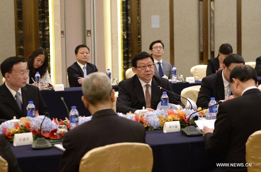 Chinese mainland-based Association for Relations Across the Taiwan Straits (ARATS) president Chen Deming (C) addresses the 11th round of talks between negotiators from the Chinese mainland's Association for Relations Across the Taiwan Straits (ARATS) and Taiwan-based Straits Exchange Foundation (SEF), in Fuzhou, capital of southeast China's Fujian Province, Aug. 25, 2015. 