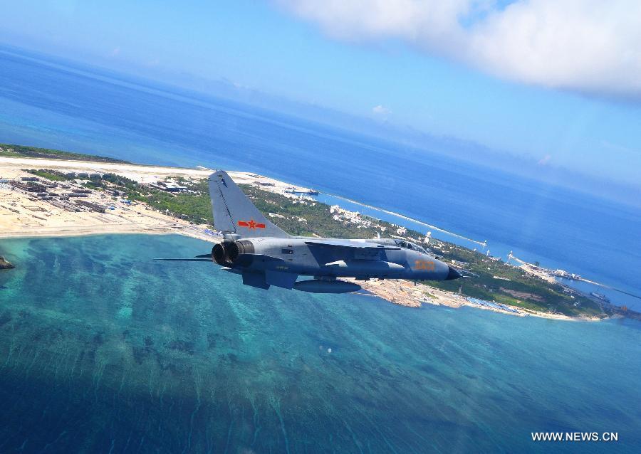 A JH-7 fighter jet of the Chinese Air Force takes part in a joint air exercise of the ongoing China-Russia joint naval drills, Aug. 24, 2015.