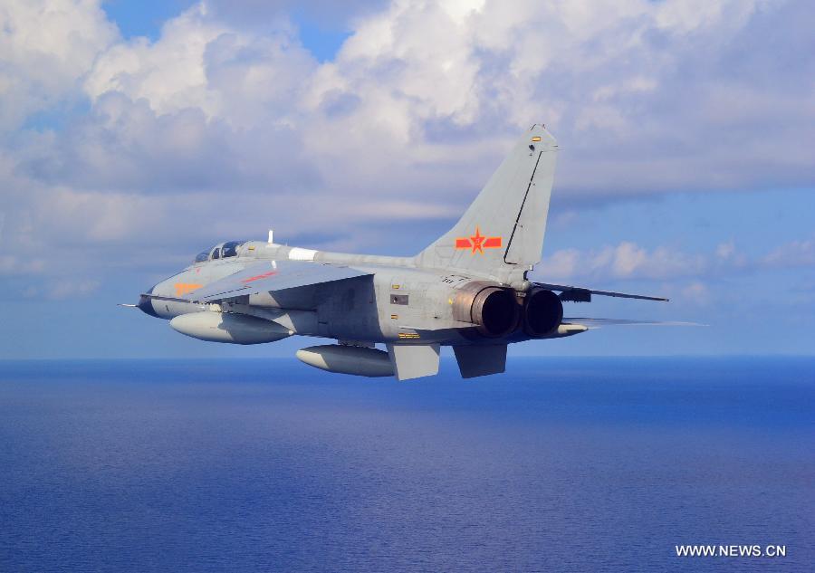 A JH-7 fighter jet of the Chinese Air Force takes part in a joint air exercise of the ongoing China-Russia joint naval drills, Aug. 24, 2015.