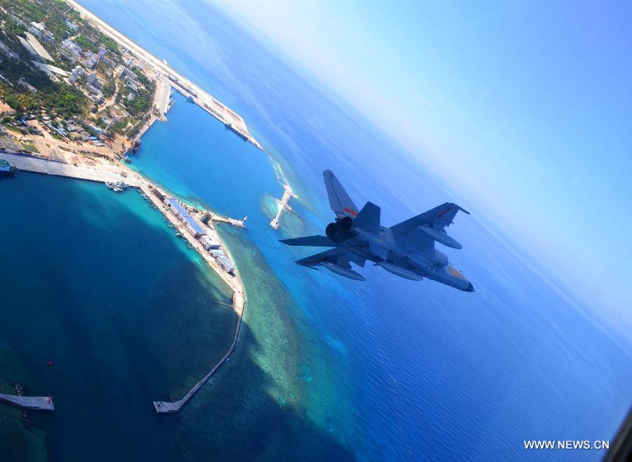 A JH-7 fighter jet of the Chinese Air Force takes part in a joint air exercise of the ongoing China-Russia joint naval drills, Aug. 24, 2015. 