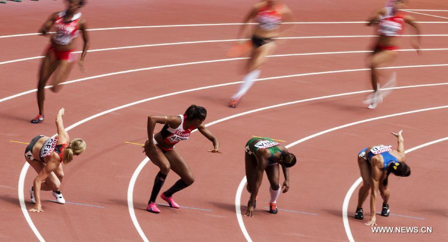 (SP)CHINA-BEIJING-IAAF WORLD CHAMPIONSHIPS-WOMEN'S 4X100M RELAY HEATS (CN)