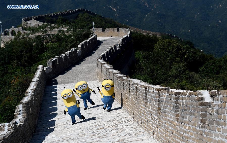 The three leading characters in the 3D animation movie 'Minions' Stuart, Kevin and Bob got on the Great Wall to say hi to the Chinese audience on Saturday, which also opened their promotion travel in China. The movie will be released in China on Sept. 13.