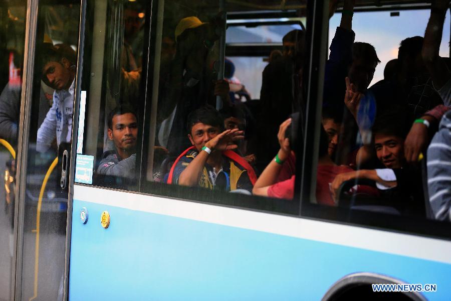 Refugees arrive at a tempopary settlement in Munich, Germany, on Sept. 5, 2015. 