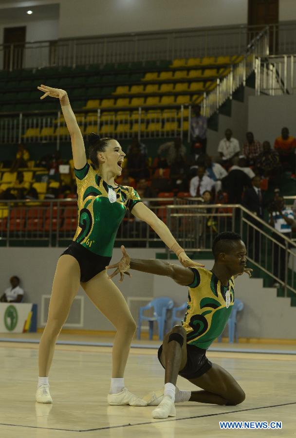 Dominique (L) and Mafona of South Africa compete during the mixed doubles final of aerobics event at the 11th All-Africa Games in Brazzaille, Republic of Congo, on Sept. 8, 2015.