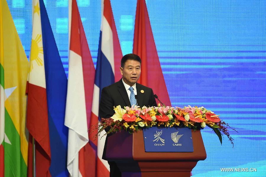 Yi Xiaozhun, deputy director-general of the World Trade Organization (WTO), addresses the opening ceremony of the 12th China-ASEAN Expo and the China-ASEAN Business and Investment Summit in Nanning, capital of southwest China's Guangxi Zhuang Autonomous Region, Sept. 18, 2015.