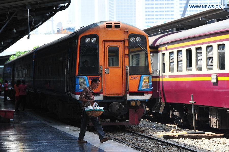 A man walks at Hua Lamphong Station in Bangkok, Thailand, Sept. 21, 2015.