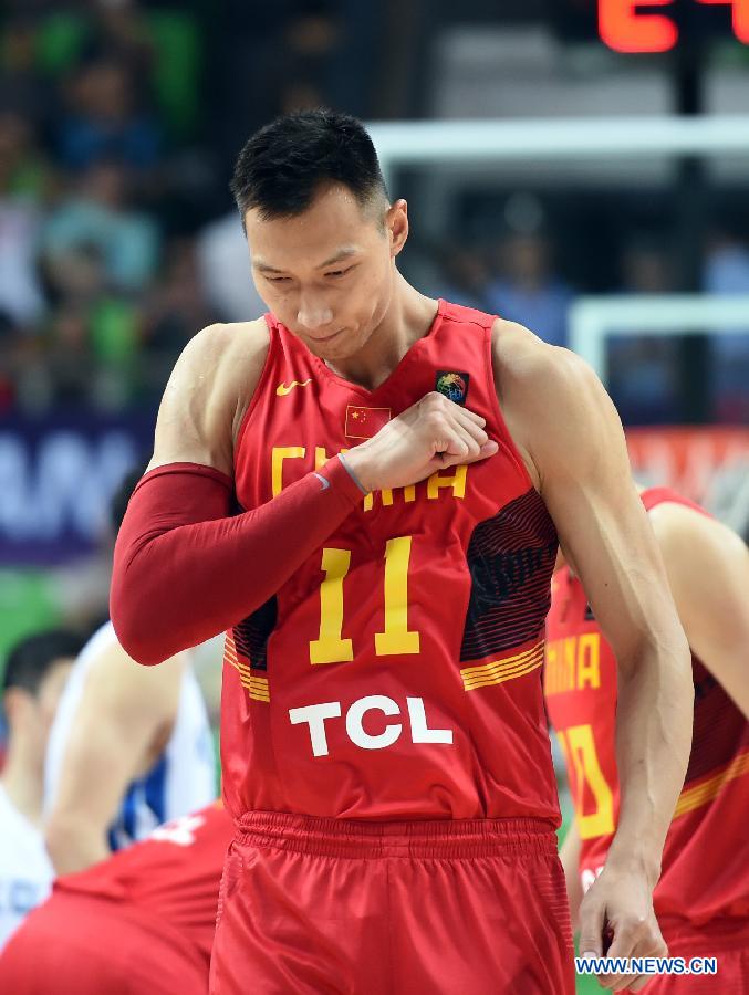 Yi Jianlian of China reacts during the preliminary round Group C match against South Korea at 2015 FIBA Asia Championship in Changsha, capital of central China's Hunan Province, Sept. 24, 2015. 