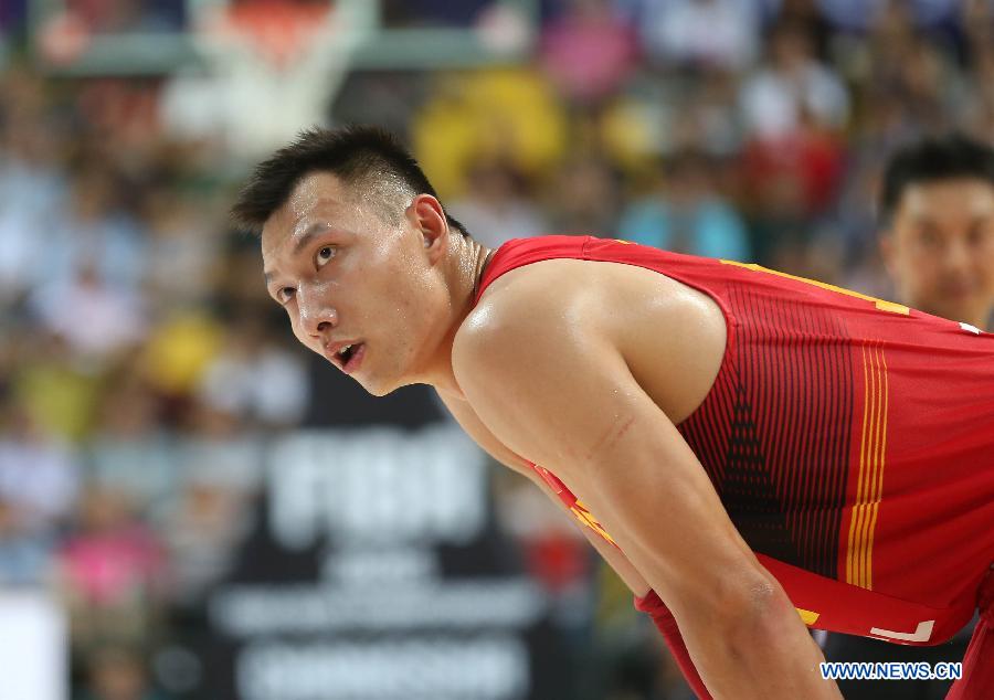 Yi Jianlian of China looks on during the preliminary round Group C match against South Korea at 2015 FIBA Asia Championship in Changsha, capital of central China's Hunan Province, Sept. 24, 2015.